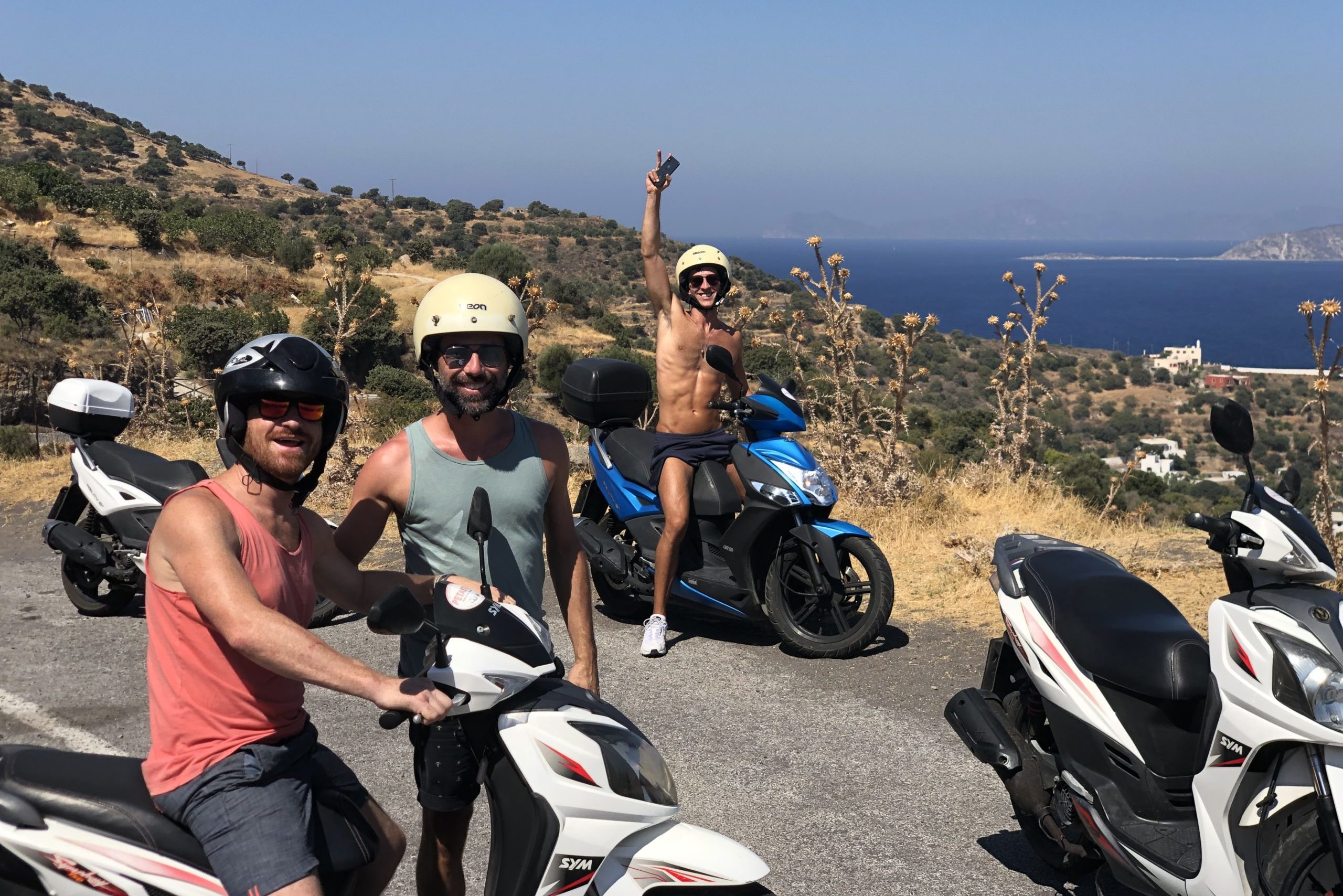 Saltyboys on scooters Santorini