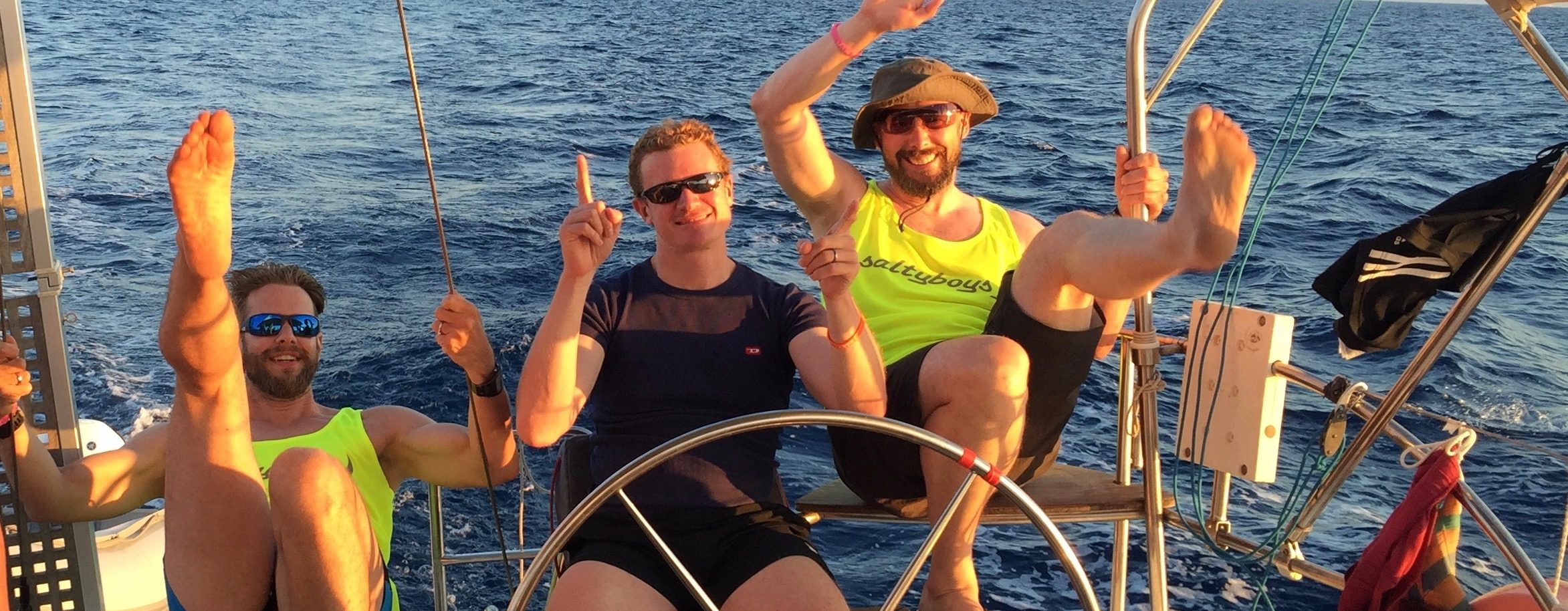 Saltyboys happy at the helm